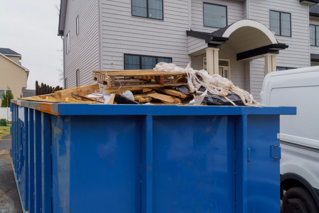dumpster for construction debris, roofing debris disposal dumpster at St. Paul, Minneapolis, and Twin Cities by MinneSnow at MN Minnesota